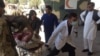 A victim wounded in the Gardez attack arrives at a local hospital.