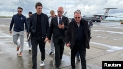 Russian presidential envoy Kirill Dmitriev (center) walks with US special representatives Jared Kushner (left) and Steve Witkoff (right) in Moscow on September 5.