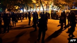 Bangladesh-- Bangladeshi security personnel stand guard outside a restaurant during an attack in Dhaka's high-security diplomatic district early on July 2, 2016.