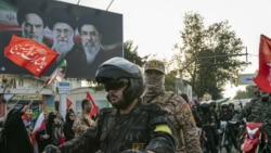 Military personnel and paramilitary members of Iran’s Islamic Revolutionary Guards Corps parade in Rasht, Iran.