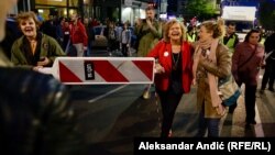 Protesters rally in central Belgrade against the Serbian government on April 6.