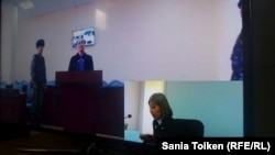 Toktar Toleshov testified through a video link from Astana on October 17.