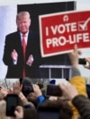 (FILES) Pro-life demonstrators listen to US President Donald Trump as he speaks at the 47th annual "March for Life" in Washington, DC, on January 24, 2020.