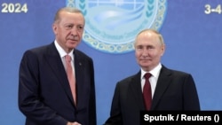 Recep Tayyip Erdogan i Vladimir Putin na marginama samita Šangajske organizacije za saradnju u Astani, Kazahstan, 3. jula 2024.