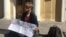 Леонид Шайдуров на пикете около комитета по образованию