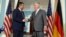 U.S. Secretary of State Rex Tillerson (R) shakes hands with German Foreign Minister Sigmar Gabriel prior to a bilateral meeting, at the State Department, in Washington, U.S., August 29, 2017