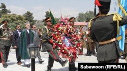 Afghan President Hamid Karzai prepares to lay a wreath at Independence Day celebrations in Kabul on August 18.