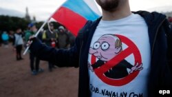 Opposition supporters take part in an unauthorized rally in central St. Petersburg on October 7.