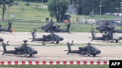 ამერიკული ვერტმფრენები Apache სამხრეთ კორეაში, ჰამფრისის სამხედრო ბაზაზე. 2026 წლის 19 აგვისტო