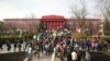 Protesters march in Kyiv on December 3 calling for the legislation that would facilitate the impeachment of the president. 