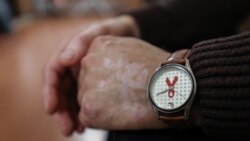 Crvena traka u satu, simbol SIDA-e