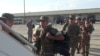 Armenia - Armenian army sergeants board a U.S. military transport plane at Yerevan airport, 4Aug2016.