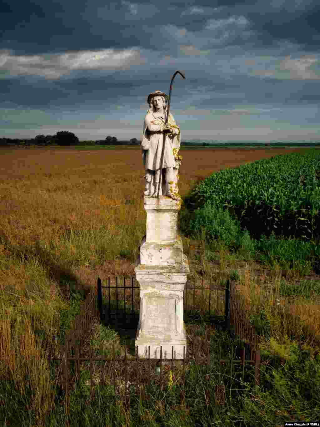 A roadside monument to St. Wendelin, the patron saint of shepherds, stands near Sumeg in western Hungary.