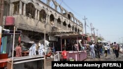 The aftermath of a bomb attack in the southern Iraqi city of Basra on May 20. 