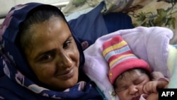 Pakistani gang-rape survivor and activist Mukhtar Mai and her son, pictured here in November 2011, will attend the meeting.