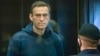 RUSSIA -- Russian opposition leader Aleksei Navalny stands in the cage during a court hearing in Moscow, February 2, 2021