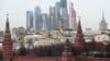 Russia -- A view of the Kremlin and the Moscow International Business Center, also known as Moskva City, with some under-construction skyscrapers in Moscow, December 3, 2014 