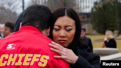 Prayer vigil for victims of the plane crash of the American Eagle flight 5342, at Wichita City Hall, in Wichita