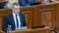Vicepreședintele comisiei juridice, pentru numiri și imunități, Igor Chiriac, prezintă plenului Parlamentului amendamentele la legea cetățeniei R. Moldova, 14 mai 2026