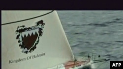 A TV grab shows the "Kingdom of Bahrain" racing yacht, on which the five British men were traveling.