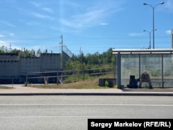 Sharashkin rests at a bus stop in Petrozavodsk, north of St. Petersburg, in July.