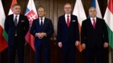 Slovakia's Robert Fico (left to right), Poland's Donald Tusk, the Czech Republic's Petr Fiala, and Hungary's Viktor Orban pose for a picture prior to the Visegrad Group meeting on February 27.