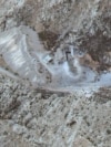 Damage seen at the entrances of tunnels at a facility in Kermanshah, western Iran. The site is believed to house an Iranian <a href="https://apnews.com/photo-gallery/iran-israel-missile-bases-satellite-photos-c2ca6d9d80567403cdb46653ffb17eb0" target="_self">missile base</a>. 