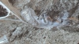 Pagube observate la intrările tunelurilor de la o instalație din Kermanshah, în vestul Iranului. Se crede că amplasamentul găzduiește o bază de rachete iraniană.