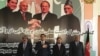 Officials from Turkmenistan, Afghanistan, Pakistan, and India meet at a TAPI project meeting in Herat, Afghanistan, in April, posing in front of a poster of the leaders of their countries.