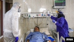 Nurses caring for coronavirus patients in a hospital in Iran. May 14, 2020