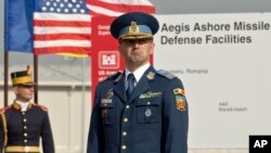 A Romanian officer awaits a ceremony marking the construction of a U.S. Aegis Ashore missile-defense base in Deveselu, Romania, in 2013. The system has long been a worry for Russia.