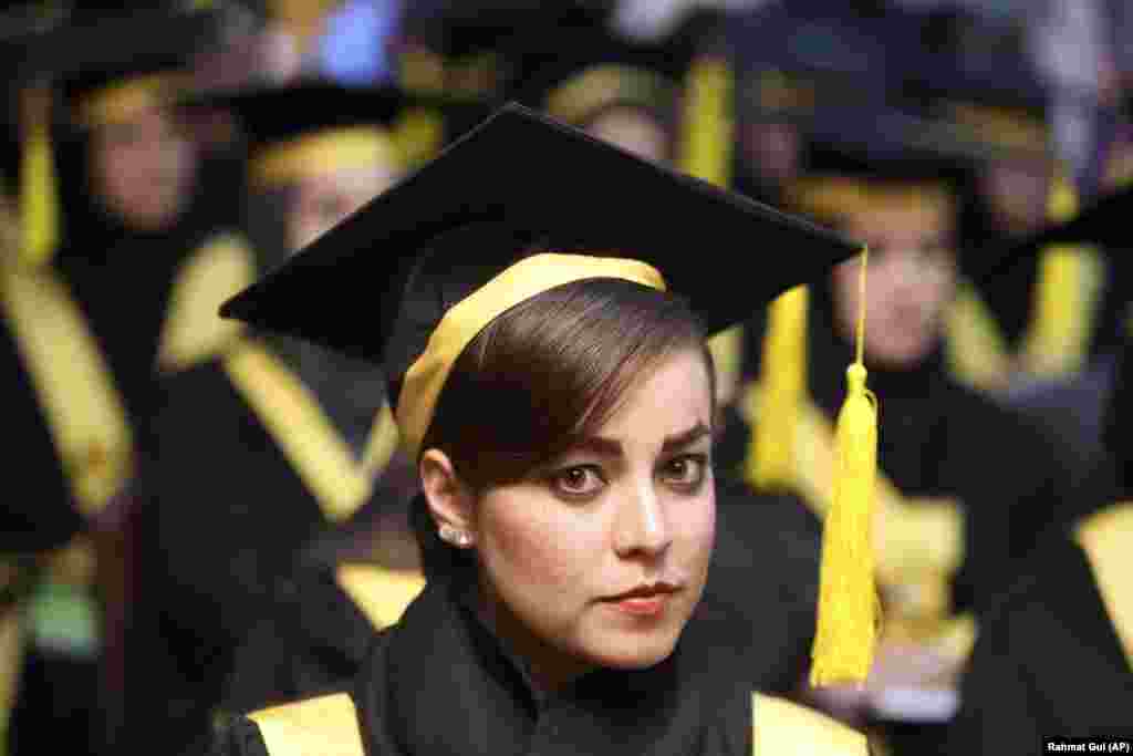 Afghan midwives attend a graduation ceremony after receiving eight months of training by the Tolo Service and Culture Organization, in a program financed by the Estonian Ministry of Foreign Affairs, in Kabul. (AP/Rahmat Gul)