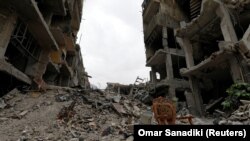 Суриядаги шаҳарлардан биридаги манзара.