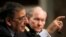 U.S. Secretary of Defense Leon Panetta (left) and U.S. Army General Martin Dempsey, the chairman of the Joint Chiefs of Staff, testify before the Senate Armed Services Committee on February 7.