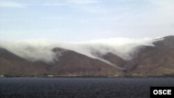 Armenia - Clouds coming down on the eastern coast of Lake Sevan.