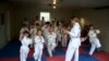 Bosnia and Herzegovina, Bihac, Children practice karate in the garage, video grab