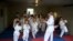 Bosnia and Herzegovina, Bihac, Children practice karate in the garage, video grab