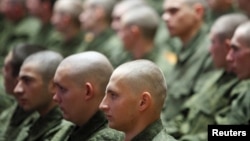 Russia -- New draftees sit during a ceremony to celebrate "Recruit Day" in the southern city of Stavropol, 16Nov2011