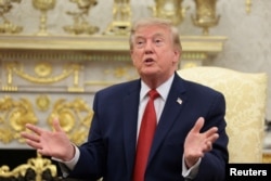 US President Trump speaks at the White House on August 17.