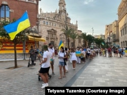 Участь у мітингах в Іспанії