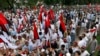 Hundreds of supporters of Pakistani opposition parties take part in a rally in Islamabad on August 8.