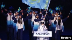 Қазақстан делегациясы қысқы олимпиаданың ашылу салтанатында. Италия, Милан. 6 ақпан, 2026 жыл.