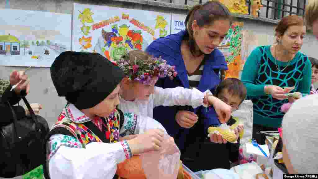 Moldova, Golden Autumn orphan children charity event at Mircea Eliade College in Chisinau