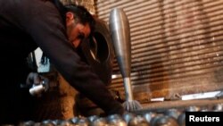 Pripadnik pobunjenika u sirijskom gradu Aleppo