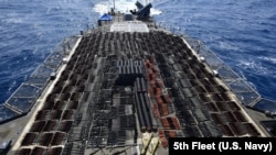 The U.S. Navy said the cache of seized weapons included dozens of Russian-made anti-tank guided missiles; thousands of Chinese Type 56 assault rifles; and hundreds of PKM machine guns, sniper rifles, and rocket-propelled grenades launchers.