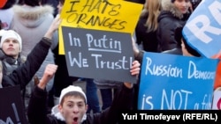 Pro-Kremlin demonstrators rally on Manezh Square in Moscow on December 12.