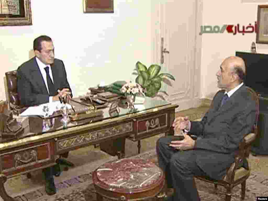 Mubarak speaks with Vice President Omar Suleiman in Cairo on February 10 during the crisis.