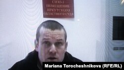 Russian opposition activist Leonid Razvozzhayev testifies in January via videolink.