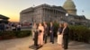 US representatives speak to journalists outside the US Capitol in Washington after the bill aiming to impose sanctions on Russia and Iran passed the House on September 16.