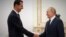 Russian President Vladimir Putin (right) meets with Syrian President Bashar al-Assad at the Kremlin in Moscow on September 13.